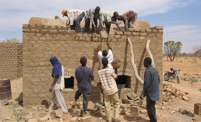 Trainee builders building a vaulted roof