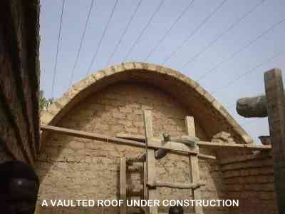 A vaulted roof under construction.